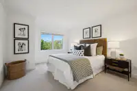 36 _ 21 Nemea Lane _ Bedroom with window overlooking the landscaped grounds