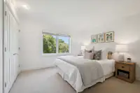 40 _ 21 Nemea Lane _ Bedroom with window overlooking the landscaped grounds