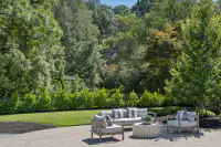 29 - 3435 Black Hawk Road - Private patio seating area overlooking the expansive, tree-lined backyard