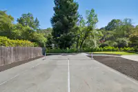 27 - 3435 Black Hawk Road - Private sport court surrounded by mature trees and lush landscaping