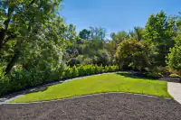 28 - 3435 Black Hawk Road - Expansive, park-like backyard with mature trees and lush landscaping