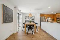 10 - 574 Monarch Ridge Drive - Dining area with breakfast bar and adjoining kitchen