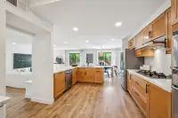 16 - 574 Monarch Ridge Drive - Open kitchen with center island overlooking the living and dining areas