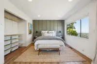 25 - 574 Monarch Ridge Drive - Bedroom with built-in closet storage and large picture window
