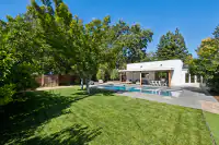 2 _ backyard-pool-and-pool-house-with-lawn