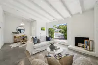 4 _ living-room-vaulted-beamed-ceiling-concrete-floor
