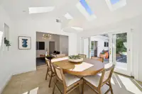 17 _ dining-room-skylights-round-wood-table