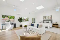 21 _ primary-bedroom-vaulted-ceiling-skylights-sitting-area