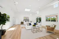 22 _ primary-bedroom-sofa-bed-sliding-door-backyard-view