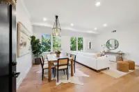 1 _ living-dining-room-black-front-door-cane-chairs