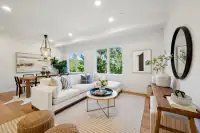 6 _ living-room-white-sectional-round-mirror-dining-view