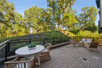 5 _ private-patio-brick-pavers-rattan-seating-hillside-view