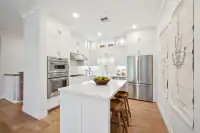 10 _ kitchen-white-cabinets-glass-uppers-arabesque-backsplash