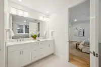 16 _ bathroom-double-vanity-mirror-bedroom-view