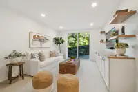 22 _ bonus-room-dog-painting-white-sofa-patio-door