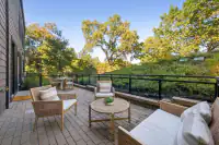 23 _ private-patio-brick-pavers-wicker-seating-hillside