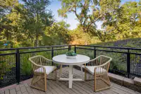 25 _ patio-nook-round-table-rattan-chairs