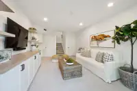 26 _ bonus-room-stairs-tv-console-sofa