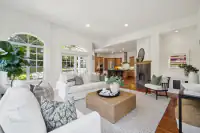 11 _ 2 Reliez Manor Court - Living room with fireplace, seating area, and view of the kitchen