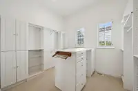20 _ 2 Reliez Manor Court - Primary bathroom with dual vanities, soaking tub, and glass-enclosed shower