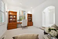 27 _ 2 Reliez Manor Court - Office with built-in desk, shelving, cabinetry, chair, and window seating area