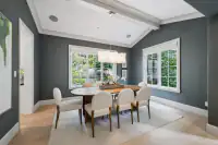 7 _ 31 Sandy Court _ Dining room with table, upholstered chairs, windows, and pendant lighting