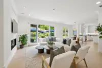 19 _ 31 Sandy Court _ Open-plan living area adjacent to the kitchen and dining spaces