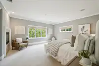 28 _ 31 Sandy Court _ Spacious bedroom with multiple windows and sitting area