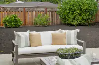 12 _ 866 Wilmore Ave _ Backyard patio with outdoor seating and landscaped garden beds
