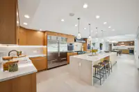 12 _ 3724 Happy Valley Road _ Kitchen with island and bar seating