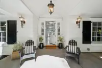 7 _ 3724 Happy Valley Road _ Covered entry with seating