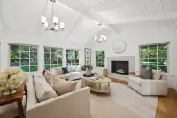 9 _ 3724 Happy Valley Road _ Living Room with fireplace and seating area