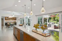 16 _ 3724 Happy Valley Road _ Kitchen with island and dining area