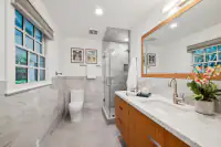 39 _ 3724 Happy Valley Road _ Vanity, shower, and toilet