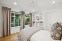 43 _ 3724 Happy Valley Road _ Built-in shelving and large windows
