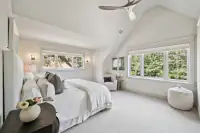 23 _ 1751 Reliez Valley Road _ Bed with upholstered headboard, sitting area, and large windows