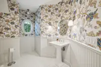33 _ 1751 Reliez Valley Road _ Powder room with floral wallpaper, pedestal sink, oval mirror, and tile flooring