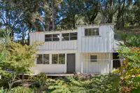 45 _ 1751 Reliez Valley Road _ Exterior with enclosed lower level, upper windows, and surrounding landscaping