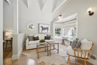 36 _ 1751 Reliez Valley Road _ Living room with bay window, exposed ceiling beams, sofa, and lounge chair