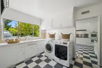 12 _ 3336 Las Huertas _ Kitchen with laundry area and large window