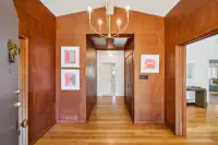 3 - 3336 Las Huertas Road _ Entry with wood-paneled hallway