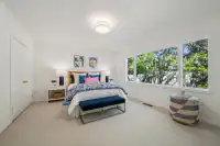 22 _ 3336 Las Huertas _ Bedroom with large windows and bench seating