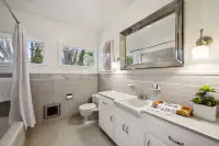 23 _ 3336 Las Huertas _ Bath with vanity, tub, and tiled shower walls