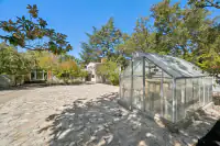 38 _ 3336 Las Huertas _ Backyard Greenhouse and stone patio