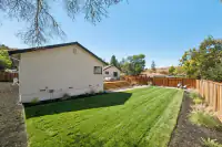 29 _ 3208 Camino Colorados _ Backyard with a lawn, deck, and fenced yard