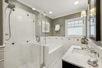 23 _ 4022 Happy Valley Road _ Bath with glass-enclosed shower and tub combination
