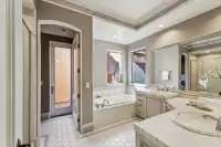 36 _ 24 Cosso Court _ Built-in soaking tub and tiled vanity with large mirror