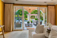 28 _ 24 Cosso Court _ Primary Bedroom with sliding glass doors overlooking the backyard