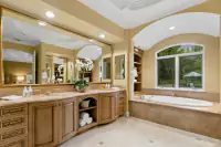 32 _ 24 Cosso Court _ Double vanity and soaking tub beneath a window