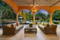 30 _ 24 Cosso Court _ Covered patio seating area facing the pool